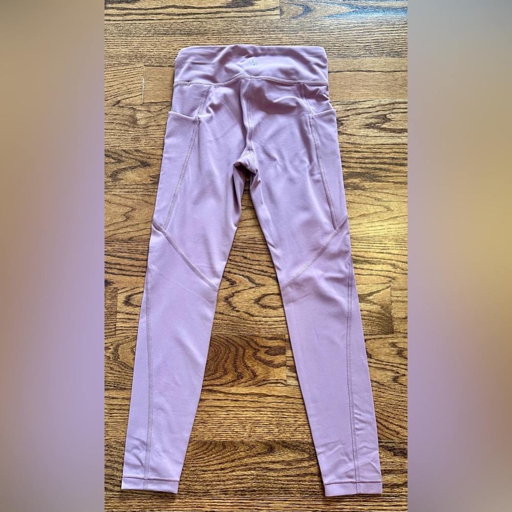 Athleta Girl High Rise “Stash Your Treasures” tight.